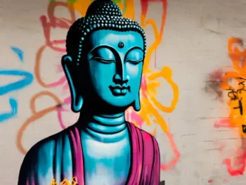 Buddha on a wall painted in grafitti style